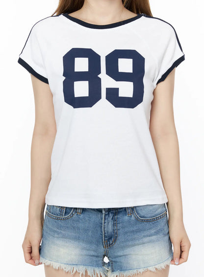 89 Graphic Raglan Short Sleeve Top CU511